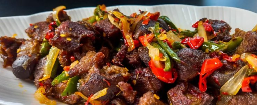 Goat Meat (Asun) - West African catering by Monmu & Monje